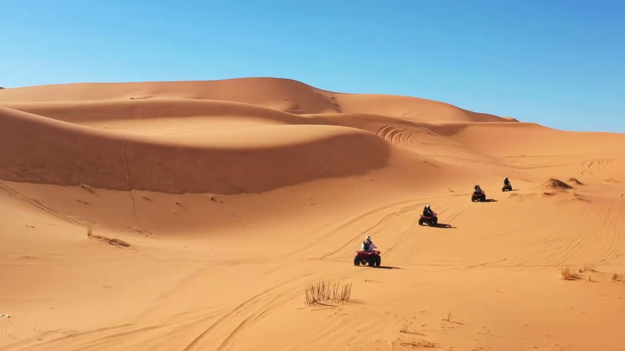 Sand dunes of the Sahara under a clear sky, from the Moratra film