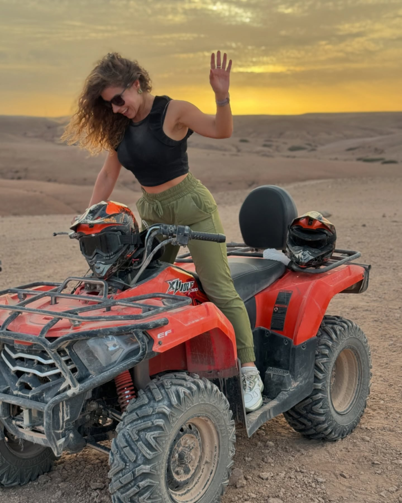 Traveler enjoying quad bike ride in Agafay desert