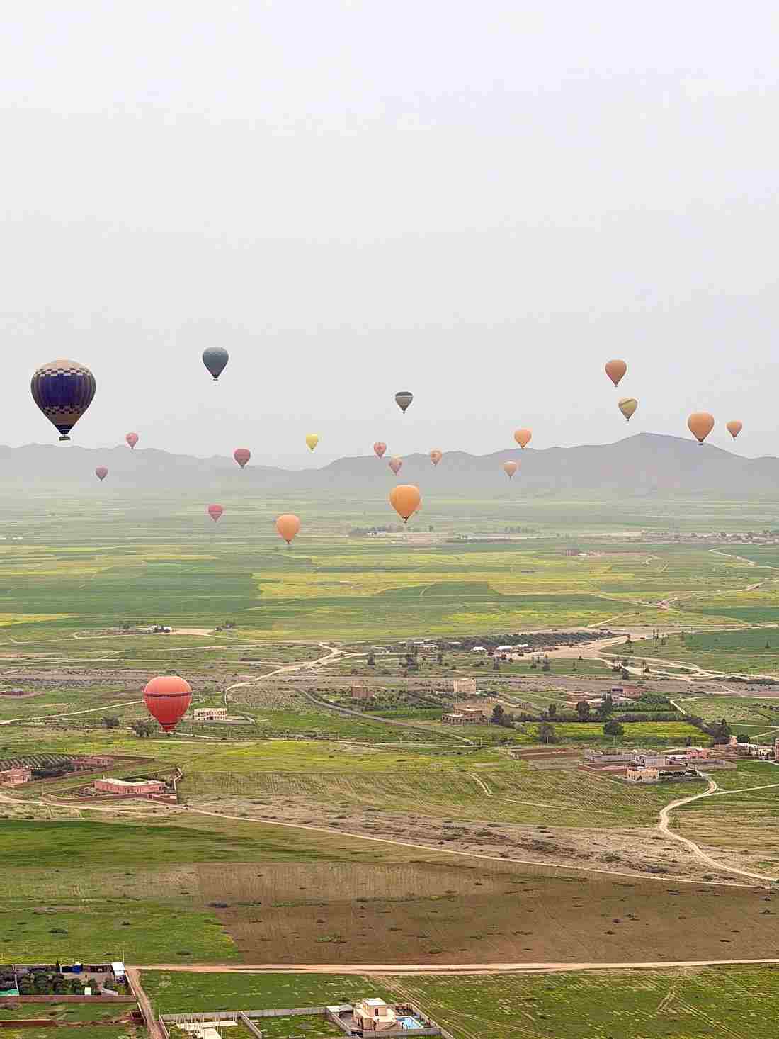 4 Days in Marrakech: The Perfect Long-Weekend Itinerary 4 Hot air balloon rising at sunrise over the plains near Marrakech