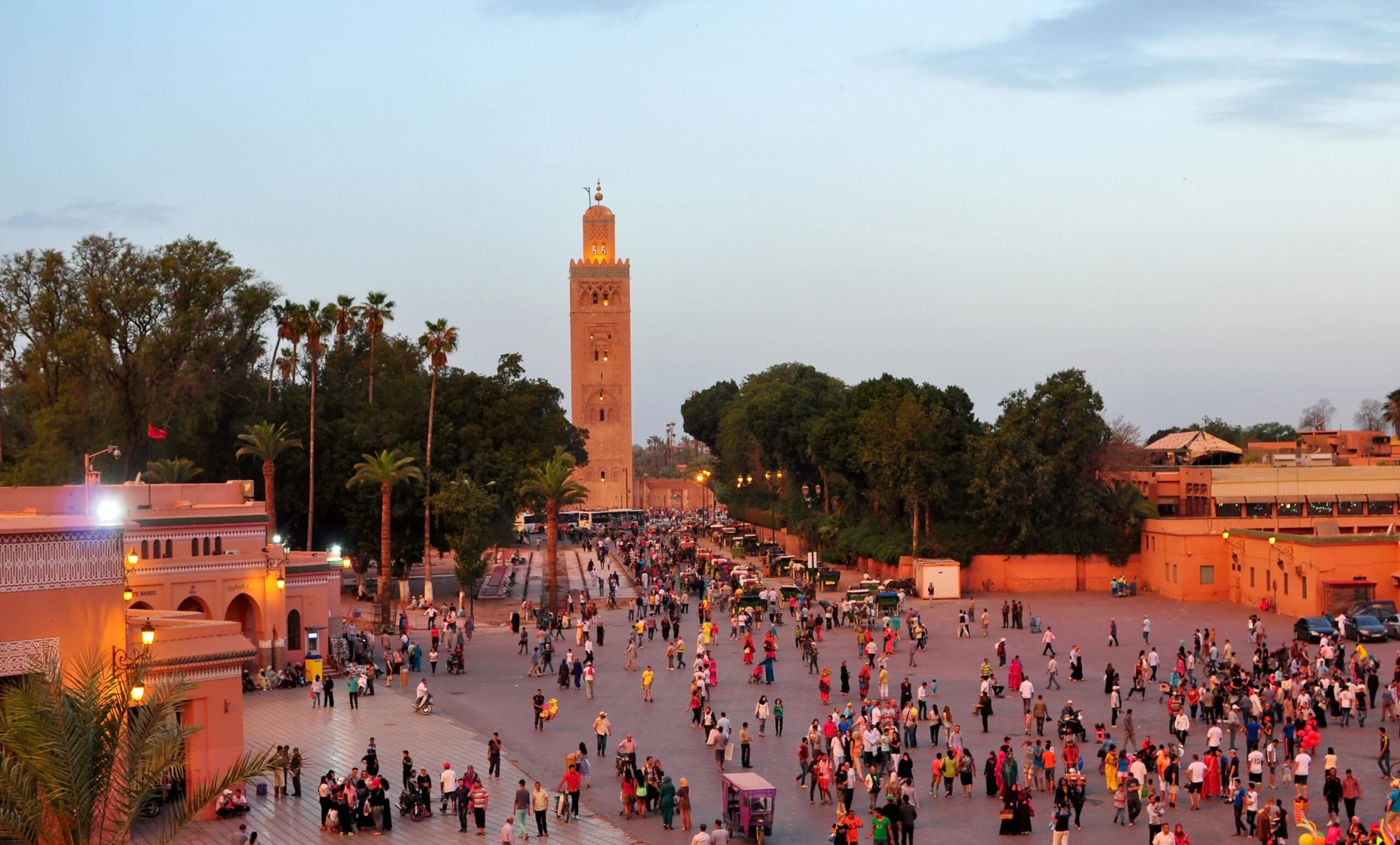 Koutoubia Mosque and Jemaa el-Fna square in Marrakech at sunset